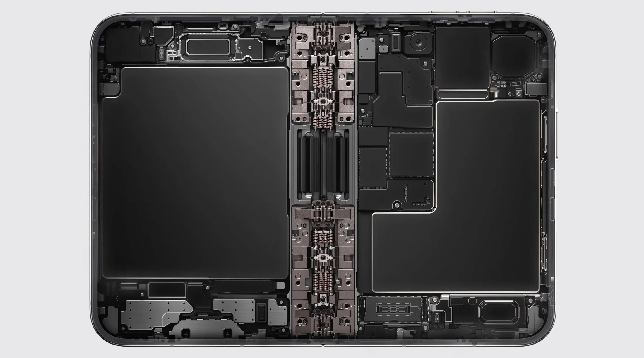 Innenansicht des aufgeklappten iPhone Duo mit einem Akku in jeder Gerätehälfte und dem Scharnier in der Mitte.